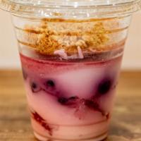 Yogurt Parfait · Vanilla yogurt layered with mixed berries and granola.