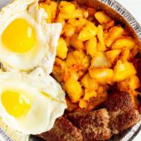 Homefries · Two eggs any style, bacon sausage or ham, regular coffee, tea, or juice and toast.