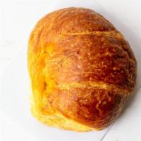 Croissant · One egg, ham, cheese, regular coffee, tea, or juice.