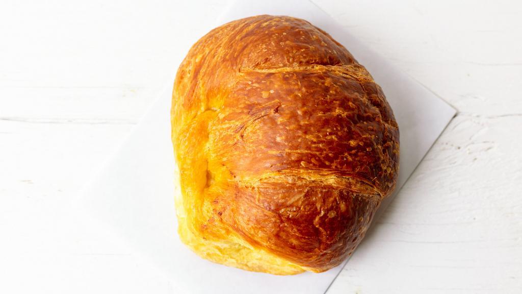 Croissant · One egg, ham, cheese, regular coffee, tea, or juice.