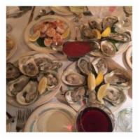 Discovery Bay Oysters · Served raw on the 1/2 shell sold by the piece.