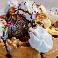 Belgian Waffle Sundae · Golden crisp Belgian waffle with two scoops of your favorite ice cream, nuts, chocolate syru...
