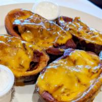 Stuffed Potato Skins · Choice of broccoli & melted cheddar, bacon & melted cheddar.