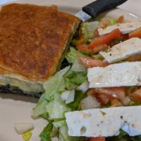 Spanakopita · Phyllo dough (strudel leaves)  filled with spinach and feta cheese.