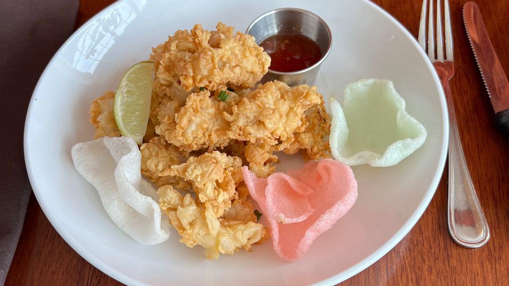 Fried Calamari · Crispy fried calamari served with thai sweet and sour sauce.