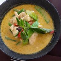 Green Curry · Spicy. Gluten free. With coconut milk, bamboo shoots, basil, and mixed vegetables.
