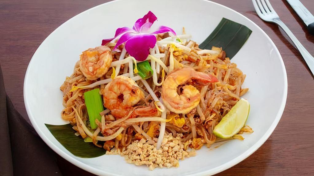 Pad Thai · Gluten free. Stir fried rice noodles, egg, bean curds, bean sprouts, scallions, and peanuts.