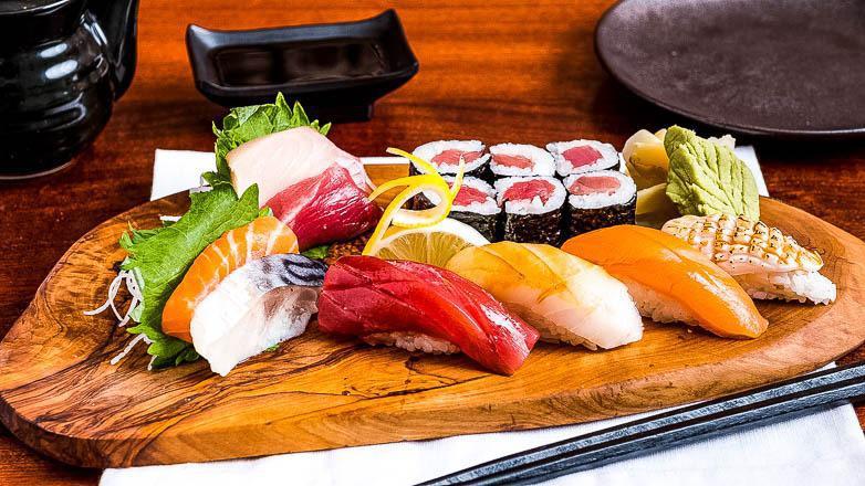 Sashimi And Sushi Deluxe · 4 piece sashimi, 4 piece sushi plus tuna maki roll
