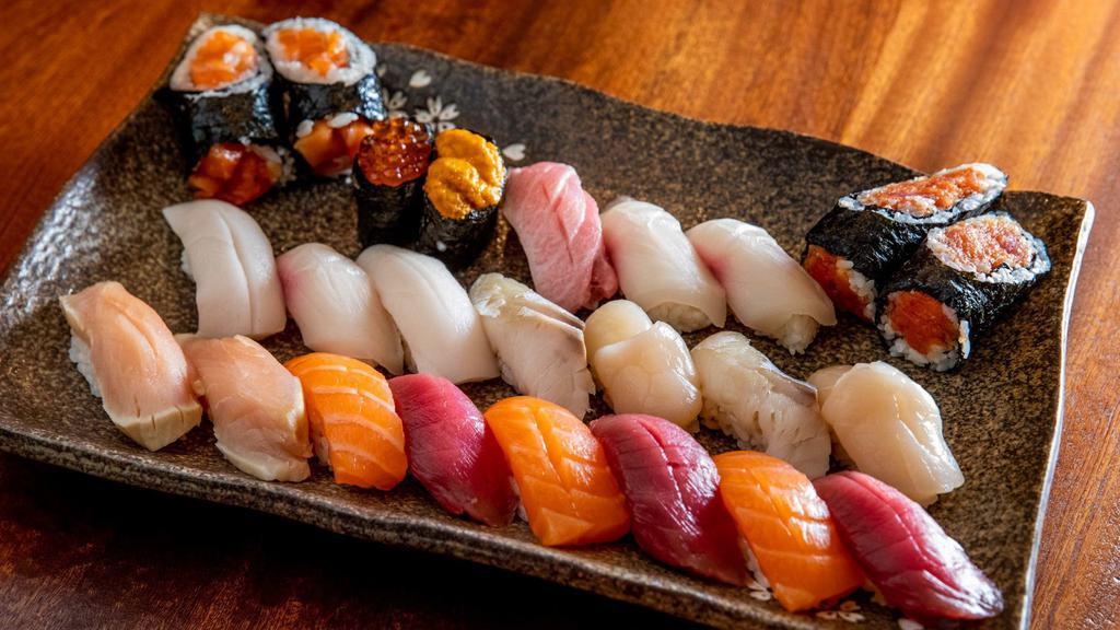 Set C. Edamame · 20 piece sushi and two hand rolls (Tuna, salmon, scallop, eel, Seared Tuna, mackerel, clam, white Tuna, hamachi, uni, snapper, Toro, spicy Tuna handroll and salmon hand roll.