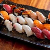 Set B. Edamame · 16 piece sushi and spicy Tuna hand roll Tuna, salmon, eel, Seared Tuna, mackerel, Toro, clam...