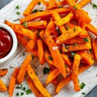 Sweet Potato Fries · Wedges of sweet potatoes, tossed with oil, sprinkled with spices, and baked on high heat unt...