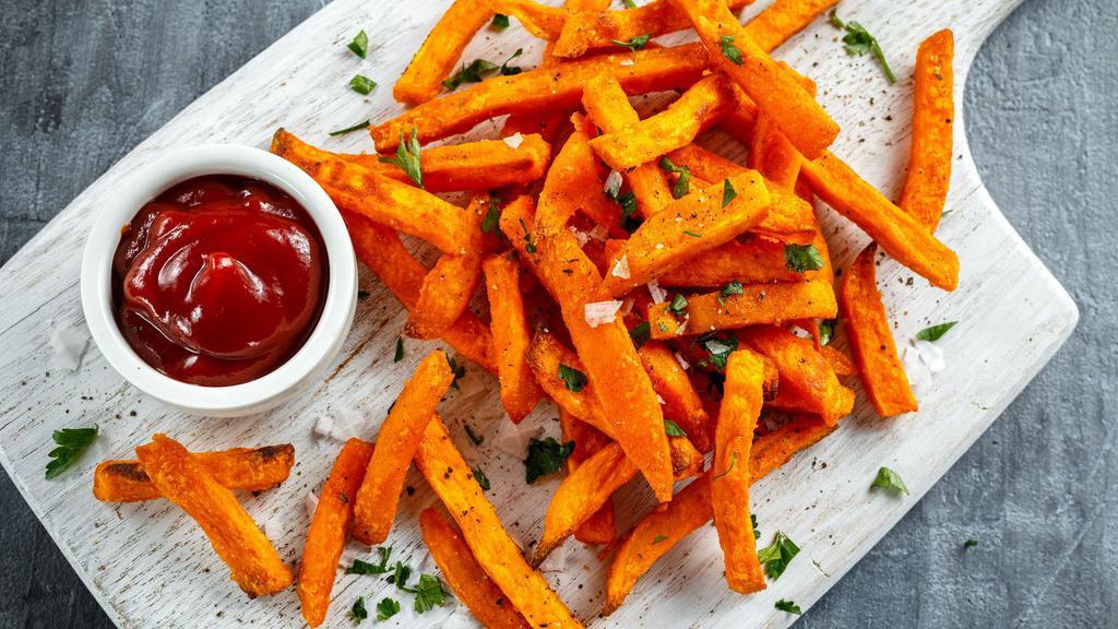 Sweet Potato Fries · Wedges of sweet potatoes, tossed with oil, sprinkled with spices, and baked on high heat until browned and crispy at the edges.
