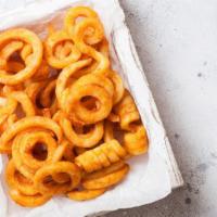 Curly Fries · Cut potatoes fried and salted.