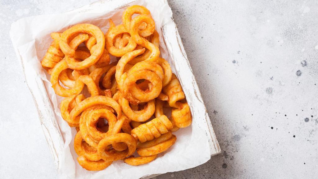 Curly Fries · Cut potatoes fried and salted.