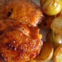 Medio Pollo Al Horno · Half Rotisserie chicken with 1 side.