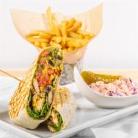 Chipotle Chicken Wrap · Sliced grilled marinated chicken with monterey jack, baby greens, tomatoes, guacamole, sweet...
