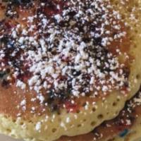Confetti Pancakes · DD's batter filled with chocolate chips and rainbow sprinkles, what could be more fun!!!