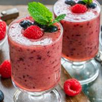 Berry Colada Smoothie · Fresh blend of a delicious berry blast of strawberry, blueberry, coconut, water and milk.