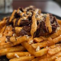 Sparta Fries · Fries, gyro meat, feta and chipotle.