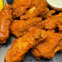 Buffalo Wings · Spicy wings served with blue cheese.