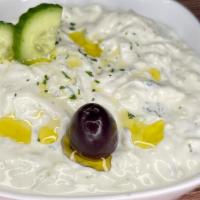 Tzatziki · Yogurt, cucumber and garlic dip.