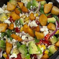 Supreme Salad · Romaine lettuce hearts, red onions, corn, avocado, red peppers, feta cheese, and roasted fri...