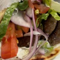 Gyro Pita · Lettuce, tomato, red onions, gyro meat, and tzatziki.