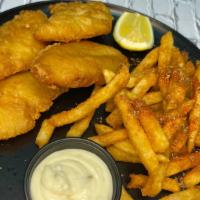 Fish & Chips · Fried fish in crispy batter, served with chips and tartar sauce.