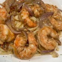 Sparta Shrimp · Sautéed shrimp with garlic, red onions, cooked in a creamy sherry sauce, served over rice, m...