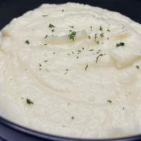 Mashed Potato · Served with gravy.