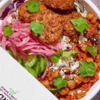 Sam´S Bowl · Cabbage, Moroccan Chickpeas, Cucumbers, Pickled Red onions, Feta, Lentil falafel, Sumac, Ses...