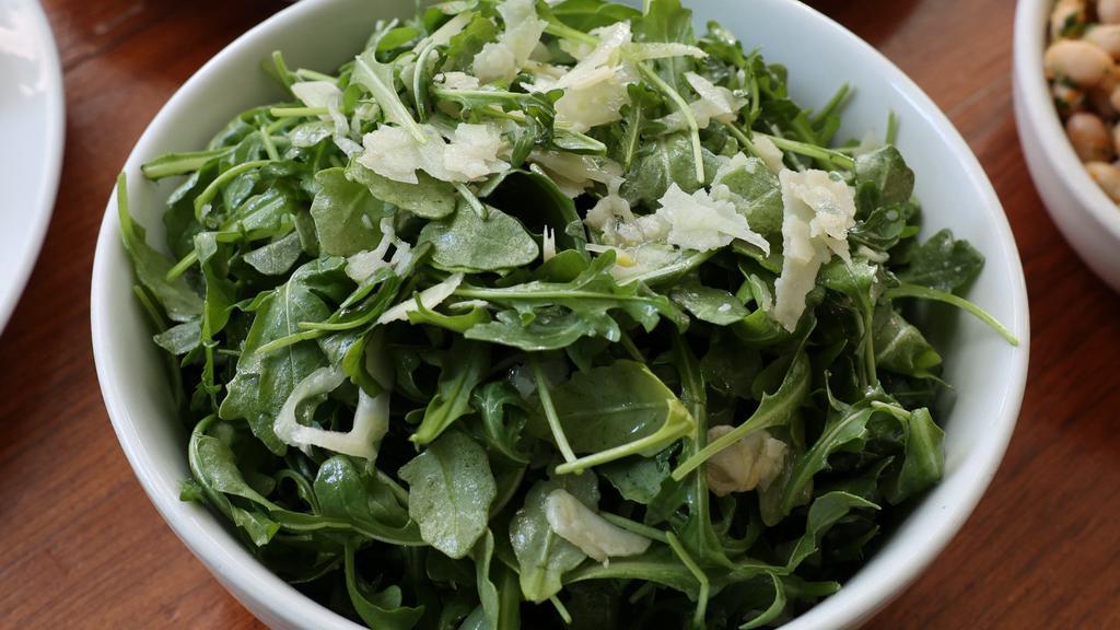 Arugula Salad · Peppery greens in a traditional Italian style salad with fennel, mint, grana and citrus. Gluten free.