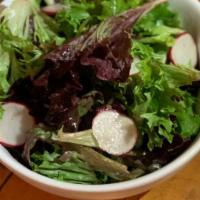 Simple Salad · Mixed greens with shaved radish and chives with red wine vinaigrette.