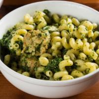 Cavatappi Chicken Pesto · Mini chicken meatballs with broccoli and pesto over corkscrew pasta.
