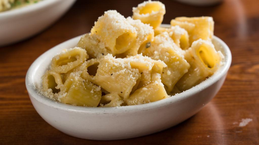 Rigatoni · Tossed with your choice of sauce and finished with Parmesan cheese.