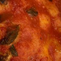 Tomato Basil Pizza · Fresh sliced tomatoes, garlic, basil & olive oil