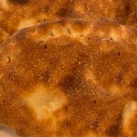 Calzone · Filled with ricotta and mozzarella cheese