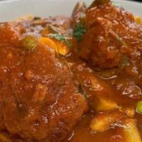 Meatballs · 3 large homemade meatballs with tomato sauce.