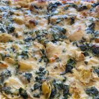 Focaccia Artichoke & Spinach · Truffle cream sauce, mozzarella and provolone cheese