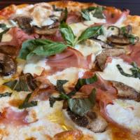 Cotto E Funghi · Fresh mozzarella cheese, wild mushrooms, ham, black olives, virgin olive