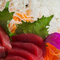 Tekka Don · Tuna sashimi over seasoned rice.