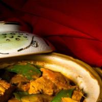 Rendang Beef Or Chicken · Spicy. The best traditional Indonesian dish cooked with lemon grass, shallot, turmeric, trop...