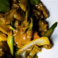 Home Style Curry Beef Or Chicken · Spicy. Sliced beef or chicken curry sauce spiced with lemon grass, coriander, turmeric and f...