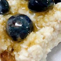 Ricotta · Housemade almond ricotta, organic blueberries, honey