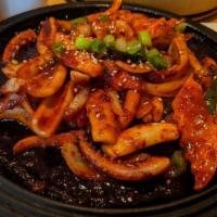 Spicy Squid Bi Bim Bob · Assorted vegetables and spicy squid over rice.