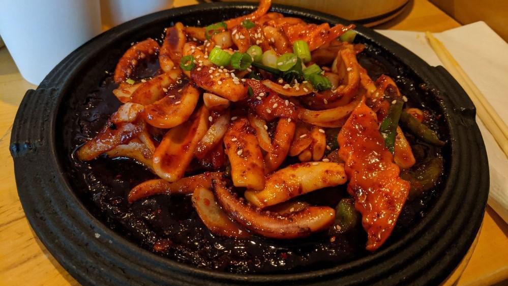 Spicy Squid Bi Bim Bob · Assorted vegetables and spicy squid over rice.