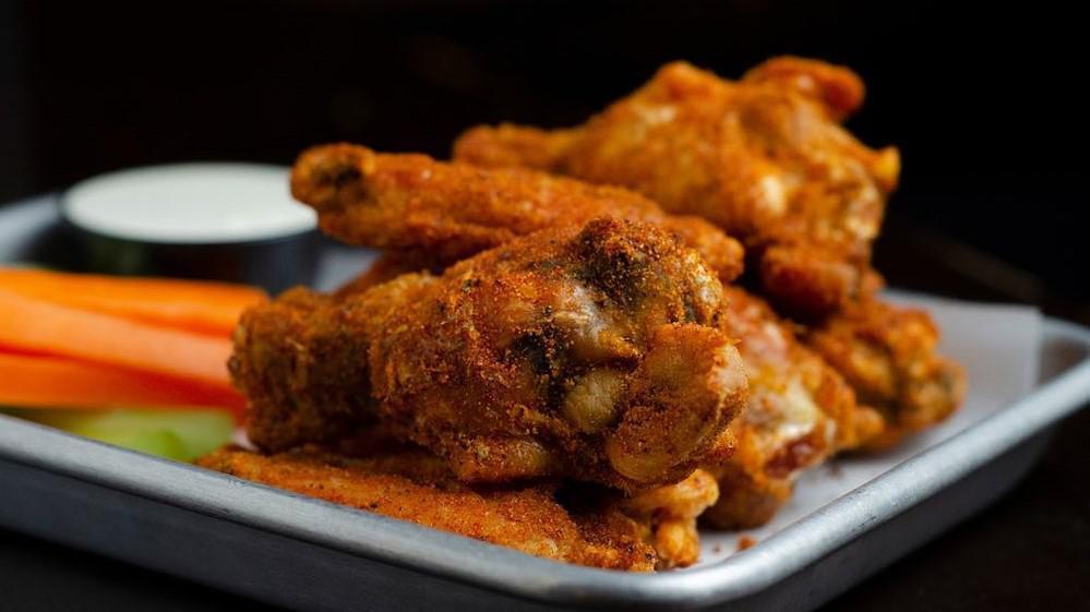 Wings · Wings Smoked In House. Served With Carrots, Celery and Blue Cheese Dressing. Come With Your Choice Of Sauce: Cajun Dry Rub, Mild Buffalo, Honey BBQ, Spicy Bourbon Maple Glaze or Spicy Habanero.