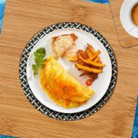 Big Trio Cheese Omelette · Eggs, Swiss, American, cheddar cheese, and avocado as an omelette.