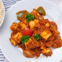 Kadai Paneer · Sautéed with Onion, peppers and spices.