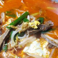 Yuk Gye Jang / 육개장 · Yuk Gye Jang / shredded beef and beansprouts in spicy egg drop soup.
served with Kim chee, b...